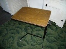 LARGE ADJUSTABLE LAP TABLE ON WHEELS EASY FOLD DOWN UPRIGHT OR SLANTING INVALID?