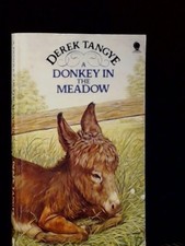 A DONKEY IN THE MEADOW.-Derek