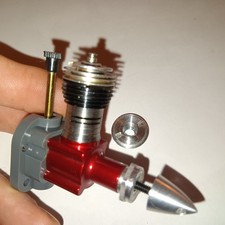 New COX RED SCORPION .049 model plane glow engine with conversion head.