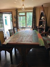 dining table, 4 chairs and a bench made from old wood boat timbers