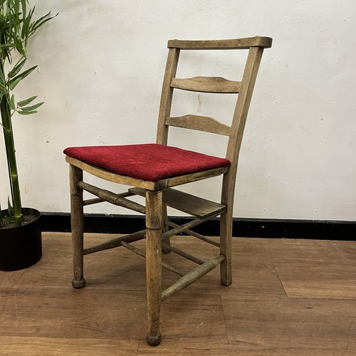 Antique wooden chapel chair