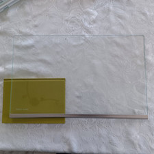 Used AEG glass fridge shelf with front protection strip - 46cm x 28cm