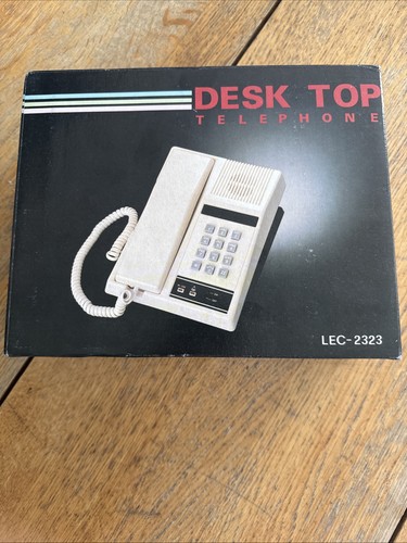 Red desk telephone unused - red,