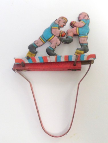 Tinplate litho hand - tinplate, held