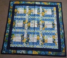 Various Colours Log Cabins Lap Quilt