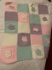 Hand knitted baby blanket in