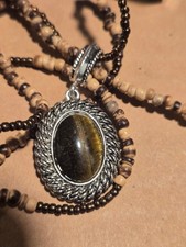 Avon Tigers Eye Pendant Multi