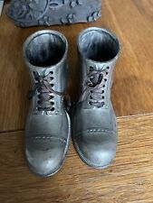 Antique silver coloured Metal