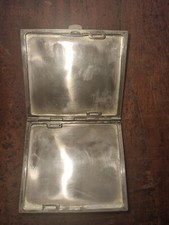 Vintage Art Deco brass cigarette case with engine-turned design, 1920s-1930s