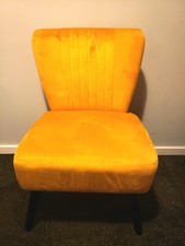Yellow velvet accent chair