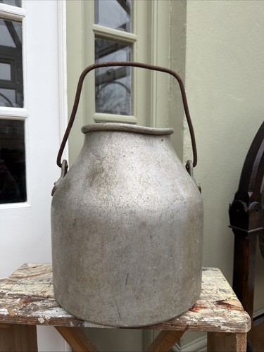 Old early original milk churn - old,