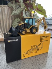 NZG CATERPILLAR 438C BACKHOE LOADER 4 WHEEL STEAR VERSION