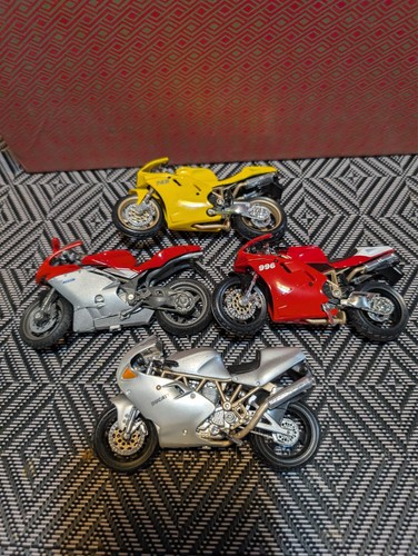 Four maisto motorcycles - four,