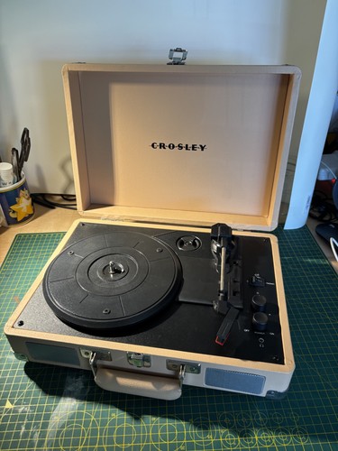 Crosley beige record player - record,