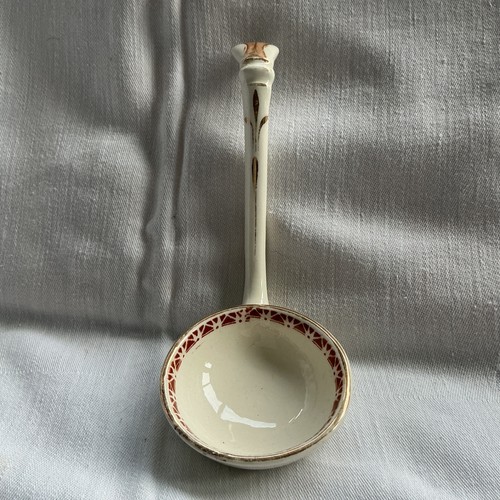 Antique pottery soup ladle
