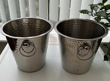 TWO STAINLESS STEEL HAMMERED
