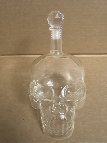 Clear skull head glass bottle - head,