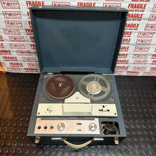 Tape recorder reel - to,