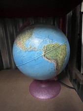 vintage illuminated world globe, likely from the 1980s or 1990s