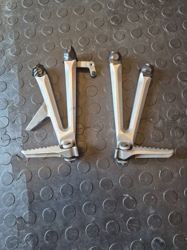 Rear passenger footrest foot - rear,