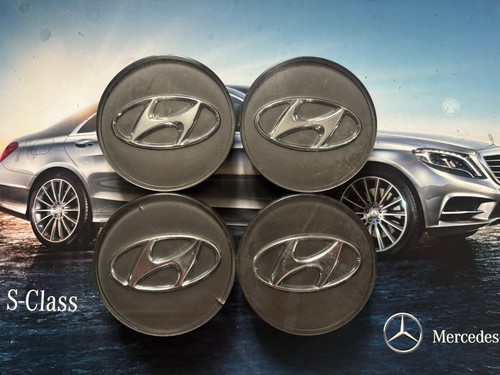 Four hyundai centre wheel caps - four,