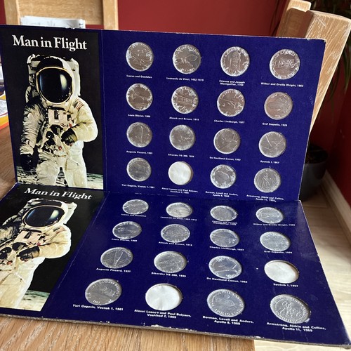 Man flight shell coin - man,