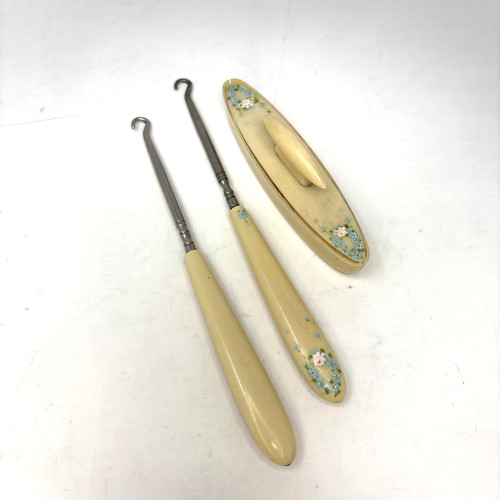 Vintage celluloid button hooks - button,