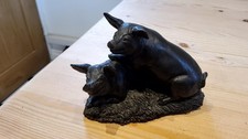 Heredities Bronze Resin Pigs