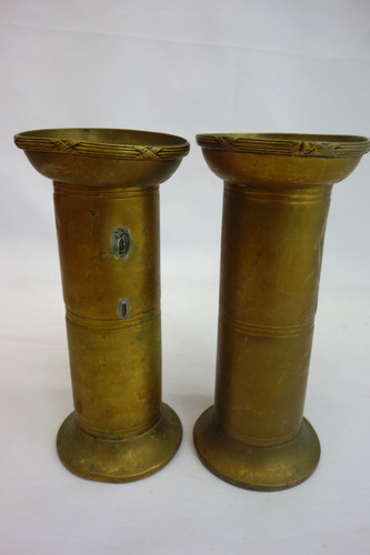 Pair brass shell case - of,