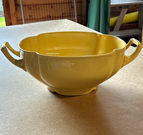 Yellow glossy oval ceramic