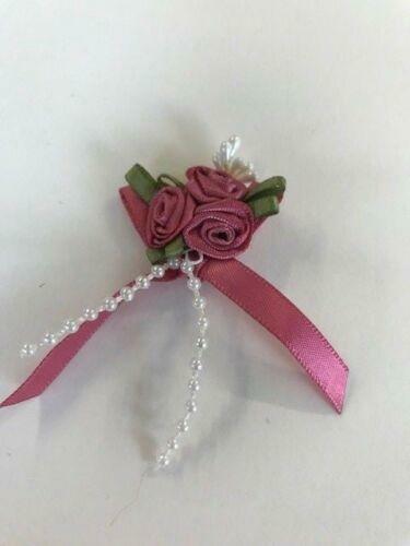 Ribbon bow and rose cluster - and,