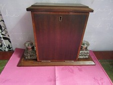 An Edwardian Mahogany Fall Fronted Desktop Stationery Cabinet With 2 Glass Inks