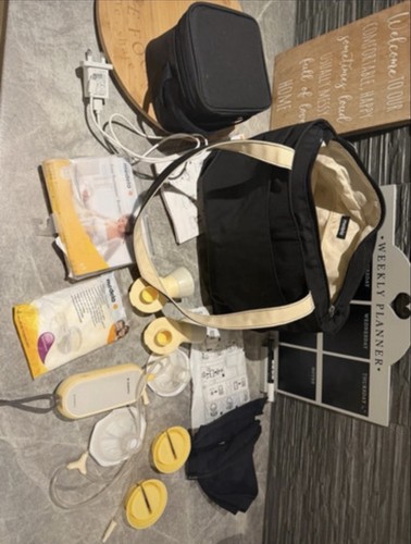 Medela electric breast - medela,