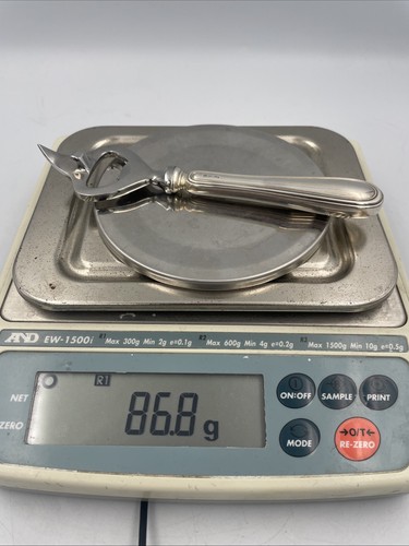 Silver bottle opener - bottle, weight