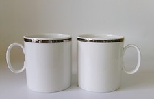 TWO THOMAS PLATINUM BROAD