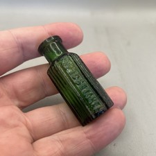 EXTREMELY SMALL GREEN GLASS