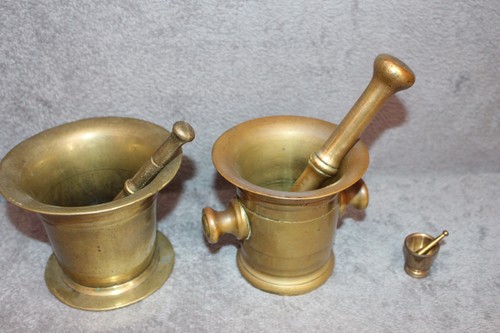 Brass pestel and mortars - and,