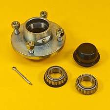 Trailer Wheel Hub 4" PCD Plastic Cap & Conical Nuts Taper Roller Hub for Trailer