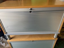 Tambour roll front storage