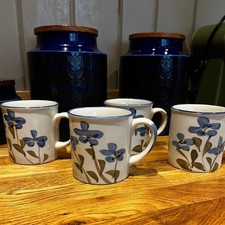 Four vintage stoneware mugs