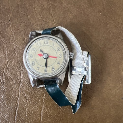 Vintage tin toy - watch, made