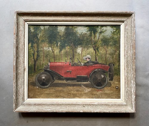 Young woman automobile - in, an
