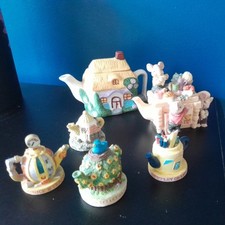 9 Tetley Miniature Teapots And