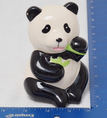 Old vintage panda bear eating - vintage,