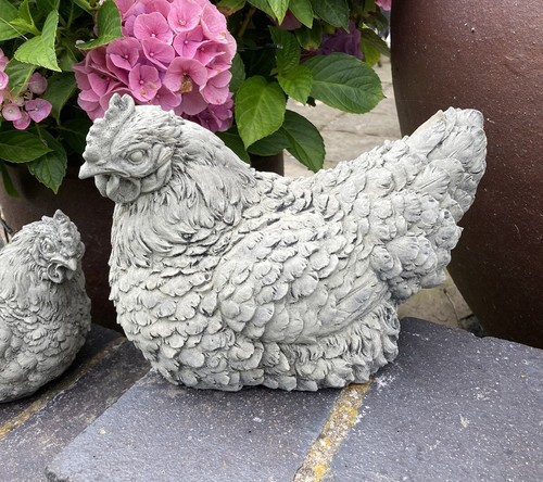 Stone garden sitting chicken - garden,