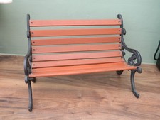 wooden bench with metal ends for doll or teddy bear