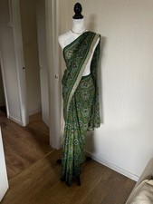Bottle green chunnri sari With Gold Border