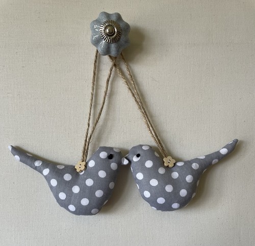 Pair padded fabric - of, hanging