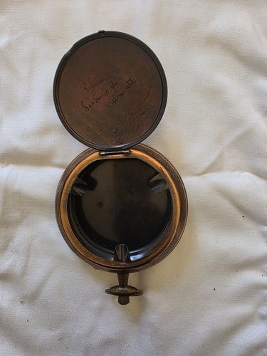 Antique brass ash tray with - ash,