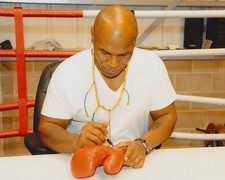 Heavyweight boxing legend Mike Tyson original signed glove LAST ONE